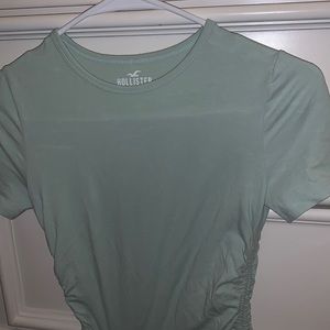 green cropped shirt